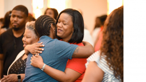 Members worshipping at a non-denominational church in Duluth GA