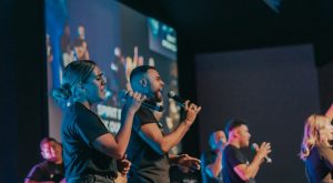 People worshipping at a non-denominational church in Norcross